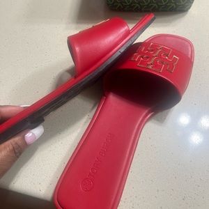 Tory Burch, red flat sandals…. Brand new great condition… size 10.5… never worn